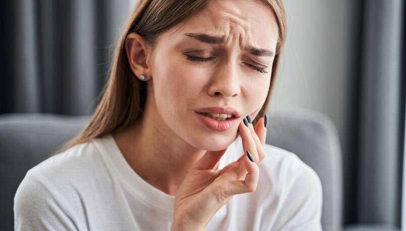 Woman Feeling Pain In Her Teeth