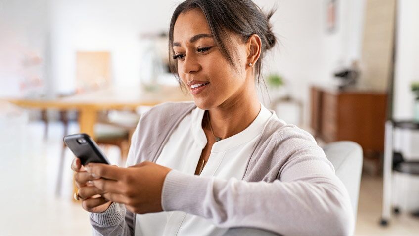 Woman Viewing User Reviews On Her Phone